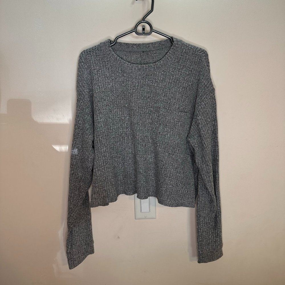 Sweater with pocket.